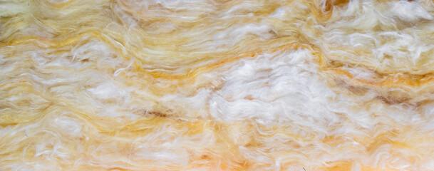 Fototapeta na wymiar yellow mineral wool with a visible texture