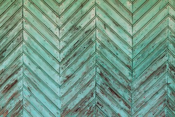 Background, texture wall finished with wooden planks covered with blue paint