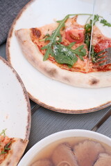 Homemade Margherita pizza healthy plate close up
