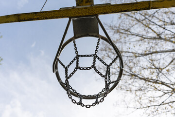  Iron basketball net. Basketball board under blue sky, sport
