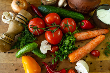 Fresh vegetables on a wooden table. Healthy food concept. Selective focus.