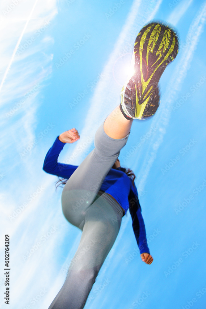 Aufkleber running and jumping over the camera. speed and action composition. shallow depth of field, focus on 