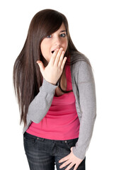 Young adult teen surprised on white background.