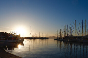 Fototapeta na wymiar sunset at the marina of alghero, sardinia, italy