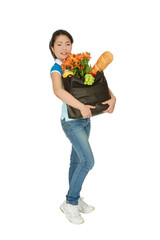 Beautiful Asian woman carrying a bag of groceries