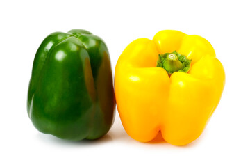 Obraz na płótnie Canvas Fresh yellow and green peppers isolated on white