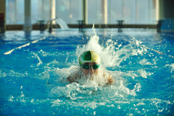 health and fitness lifestyle concept with young athlete swimmer recreating  on olimpic pool