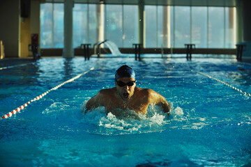 health and fitness lifestyle concept with young athlete swimmer recreating  on olimpic pool