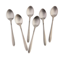 Stainless steel spoons on white background