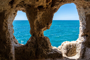Inside the caves of the Algarve rocks - 602777866