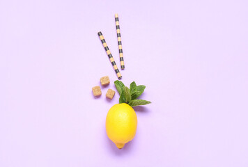 Fototapeta Ripe lemon with mint and straws on lilac background obraz