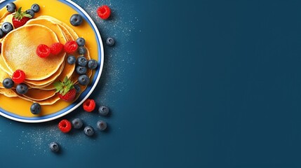 tasty pancakes with berries on top on blue background
