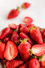 Fresh strawberries on white background, closeup