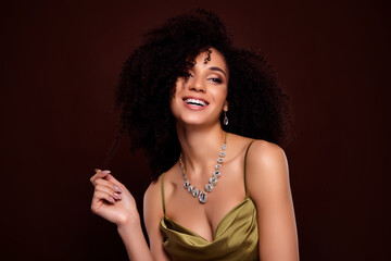 Photo of attractive lovely pretty lady enjoy vogue party wear accessories jewel dress on dark brown...