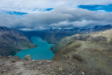 Fototapeta na wymiar Amazing view of the Gjende Glacial Lake from the Besseggen Ridge, Norway