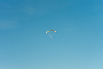 Paragliders on Mount Csobanc on a summer afternoon. Summer adrenaline-boosting sports