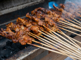 Sate Ayam or Chicken Satay, a traditional satay from Yogyakarta, Indonesia, in shallow focus