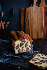 Sliced Loaf of Leopard Milk Bread on a Cooking Rack : A loaf of Japanese milk bread with leopard or giraffe spots colored with cocoa powder