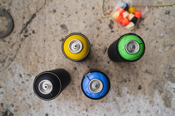 Close up of spray cans for drawing graffiti	
