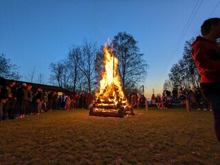 Depiction of the old custom of burning witches in the Czech Republic with a huge pile of burning...