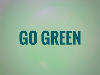 Abstract Green gradient background with text GO GREEN for environmental art, Go green and eco friendly symbol stamp printed on cardboard box. ecology, environment, nature and climate 