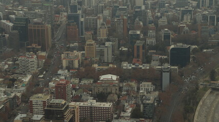 Aerial view of the city of Santiago captured from above on a very polluted day