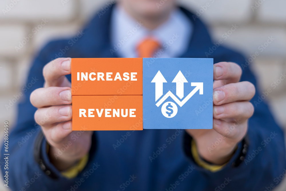 Poster man holding colorful blocks with icons and inscription: increase revenue. concept of growth hacking 
