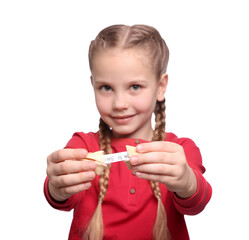 Cute girl holding tasty fortune cookie with prediction on white background