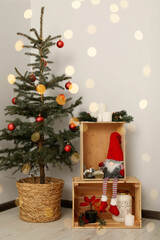 Christmas tree with red balls and festive decoration indoors