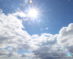 sun and clouds. blue sky with clouds. blue sky with sun. sky and clouds.