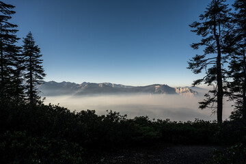 Fototapeta na wymiar Smoky Haze Hangs in the Valley Below the Mountains of Sequoia