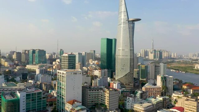Ho Chi Minh City, Vietnam - May, 2023: Aerial view of center of Saigon riverside at Ho Chi Minh City, Vientam in sunrise or sunset