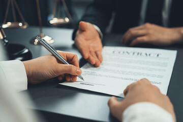 Closeup businessman sign contract or legal document with pen in his hand during corporate meeting for business deal or legal executive decision to pay off a loan or filing for bankruptcy. Equilibrium - obrazy, fototapety, plakaty