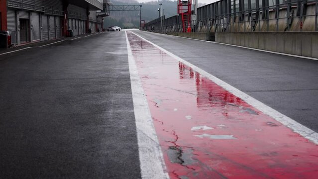 Wet race track surface after the rain in 4K