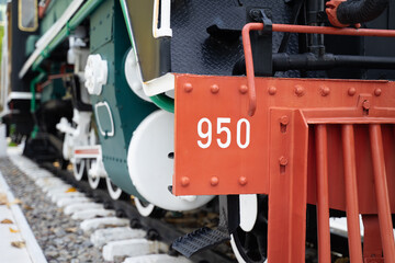 side view of a steam locomotive on the tracks