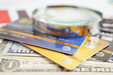 Credit card with password key lock and US dollar banknote money, security finance business concept.