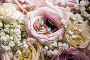 wedding rings and roses