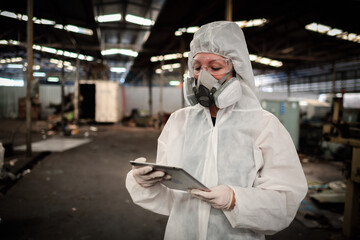 Portrait industry worker with safety uniform protective wearing gas mask to safe before start work...