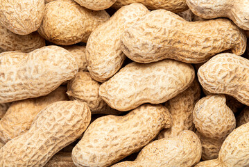 Close-up roasted peanut background.