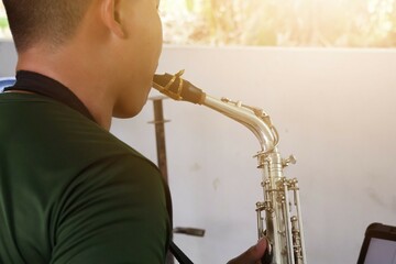 man playing saxophone