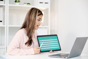 Woman study english language online by laptop computer, learning online course