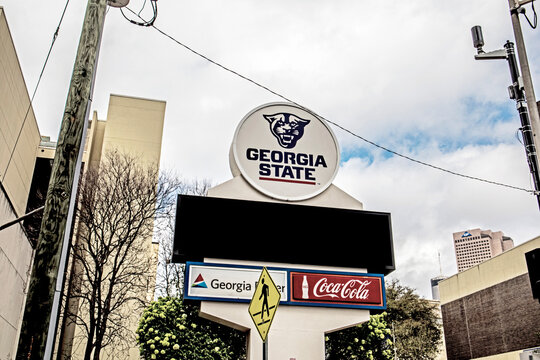 Georgia State digital street sign and clouds downtown Atlanta Georgia