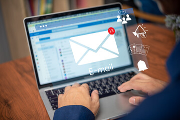 man using computer laptop icon email message. Marketing Promote business sending information, alert communications online internet social network concept.