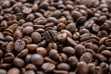 Fresh roasted brown coffee beans background