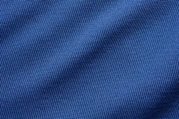 Fotobehang Blue sports clothing fabric football shirt jersey texture © Piman Khrutmuang