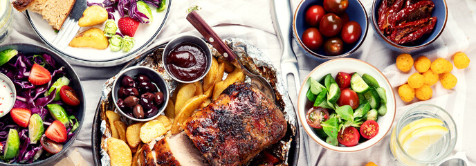 Family dinner or lunch. Many dishes on the table. Top view, copy space