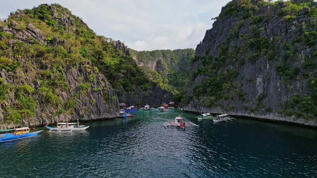 Collection of Boat drone videos taken in Philippines. Beaches, seas and classic philippine boat are the main subjects on those videos.