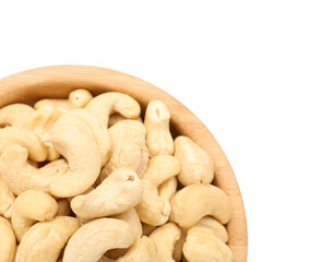 Bowl with tasty cashew nuts isolated on white background, closeup