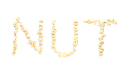 Word NUT made of cashew on white background
