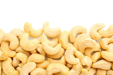 Heap of tasty cashew nuts isolated on white background